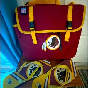 Washington redskins sports bag and a pair of flip flops.